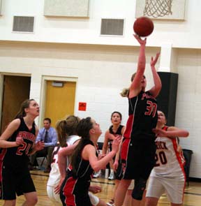 Mary Shears goes up for a lay-up at Kendrick as Kayla Johnson, NaTosha Schaeffer and Amber Holthaus watch.