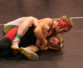 Damian McWilliams is about to pin a Potlatch opponent.