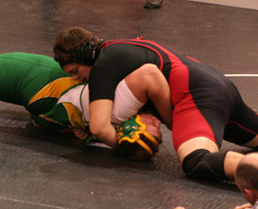 Joe Schumacher pins Cummins of Potlatch, a wrestler that pinned him a week earlier.