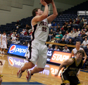 Branden Waller scores 2 of his game-high 29 points against Timberline.