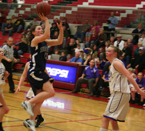 Rachel Wemhoff goes for a lay-up against North Gem.
