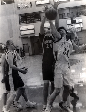 Dylan Prigge battles for a rebound. At left is Josh Schlader.