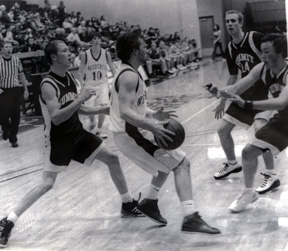 Derek Nuxoll, Dylan Prigge and Josh Frei surround Nezperces Damon Leitch.