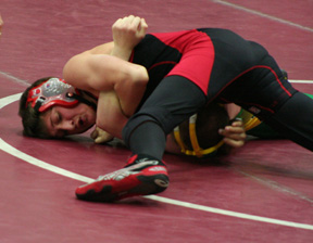 Tayler Heitman gets near fall points against Potlatchs Todd Marshall in the consolation final.