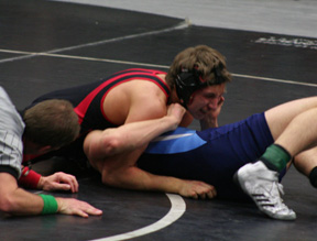 Tyrell Langston is about to pin Grangevilles Justin Robie in the championship match at 160 lbs.