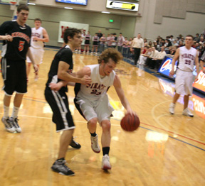 David Sigler appears to be getting fouled as he handles the ball.