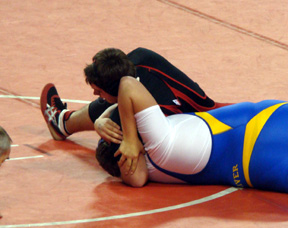 Joe Schumacher is about to pin Austin Zollinger of Raft River the first round of consolation at State. Photo by Kayla Lorentz.