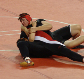 Mitch Jungert wasted little time pinning Eddie Messillas of Glenns Ferry in the consolation bracket. Photo by Kayla Lorentz.