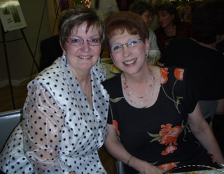 Ruth May, (left) laughs with friend Theresa Uptmor. Four years ago May was being treated for Colon Cancer. She is speaking out during March, National Colorectal Cancer Awareness Month.