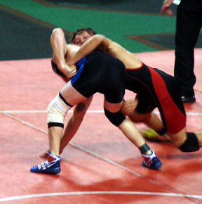 Tyrell Langston attempts to take down Coben Hoch of New Plymouth in a semifinal match at State. He won the match 6-4 to clinch at least second place. Photo by Kayla Lorentz.
