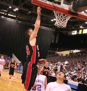 Andrew Gabica scores the layup that resulted from the pass made by Branden Waller in the photo above.