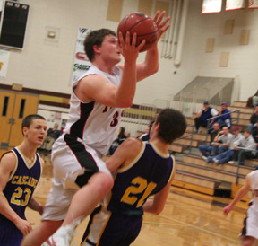 Branden Waller goes for a lay-up against Cascade.