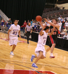 Branden Waller passes off on a transition play after he made a steal on the Castleford end of the floor. He wound up passing to Andrew Gabica who scored an easy lay-up.