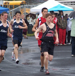 Brock Heath runs on a wet, rainy track at Kamiah. Photo by Kayla Lorentz.