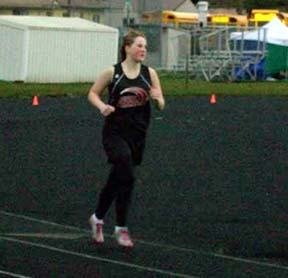 Betty Clark runs one of the distance races at the Kamiah track meet last week.