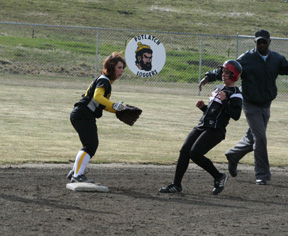 Haleigh Schmidt pulls into second with a stolen base against Timberline.