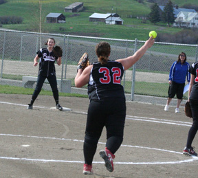 Hilaree VanderPas gets ready to throw the Lapwai runner out at first as Meaghan Bruner awaits the throw.