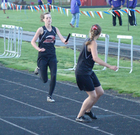 Shelby VonBargen awaits the handoff from MaKayla Schaeffer in one of the relays.