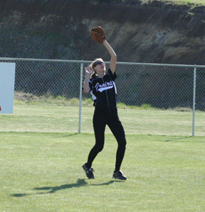 Savanah Prigge makes a catch in centerfield in the Genesee game.