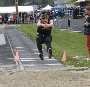 MaKayla Schaeffer flies towards the pit in the long jump.