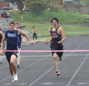 Ryan Dalgliesh nears the finish line in a 200 meter dash preliminary heat.