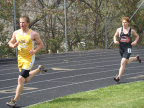 Brock Heath chases after Timberlines Austin Blaine in one of the distance events at the All-Star Meet.