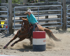 Callie Mader with her first place barrel time of 16.6 seconds.