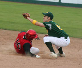 Joe Schumacher slides into second ahead of the throw after a passed ball.