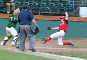 Troy Lorentz slides into home with a run in the 2nd Potlatch game.
