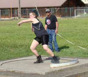 Gina Seubert had rather unusual footwear during the shot put competition at Regionals.