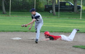Seth Guyer slides into second with a double in the Friday game.