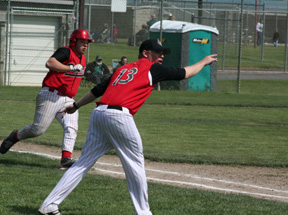 Coach Dustin Behler tells Joe Schumacher to go to second on a hit in the 2nd Potlatch game. Schumacher reached base an amazing 12 out of 16 times in the tournament with 5 times on hits and 7 times by either walk or hit by pitch.
