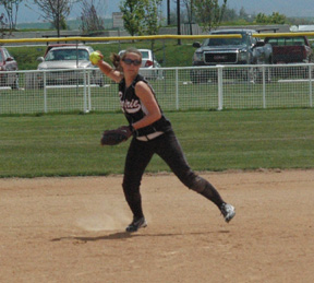 Megan Sigler makes a throw from short.
