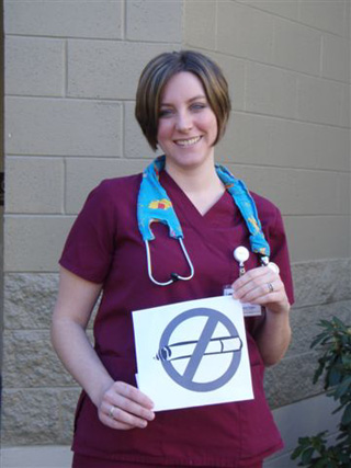 Mary Curtis, CVHC Respiratory Therapist, shows one of the tobacco free signs that will be posted on June 1st when Clearwater Valley and St. Marys Hospitals and their affiliated clinics initiate tobacco free campuses.