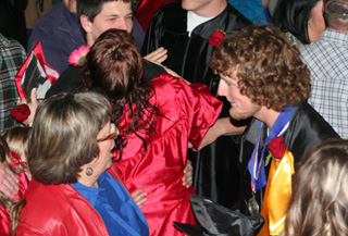 David Sigler receives congratulations from Patty Hinkelman.