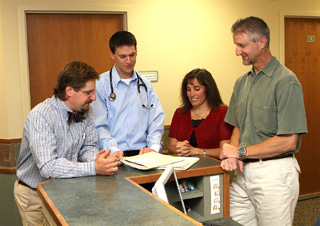 Dr Jeremy Ostrander, Dr. Andrew Gilbert and Megan Wilson, FNP, PNP discuss expansion of services in Grangeville with Gary McEwen, PT, Grangeville Physical Therapy