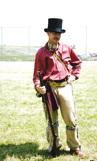 Muzzle loader demonstrator, Bart Bradish, in historical garb.