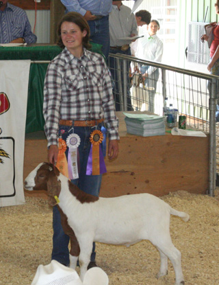 Chrysann Lusich had the grand champion quality and reserve champion fitting and showing for goats.