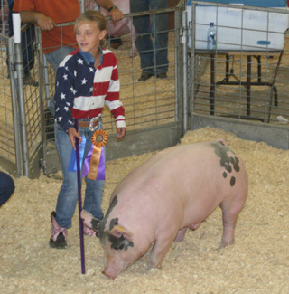 Tessa Godfrey of Grangeville had the grand champion market hog.