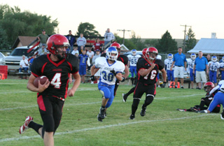 Devin Schmidt was off to the races for the first of his 4 TD's. #76 is Colton Nuxoll.