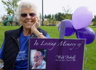 Edna Ruhoff with the picture of her late husband Walt at the Purple Ride in Coeur dAlene to remember pancreatic cancer victims.