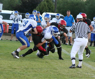 David Johnson and Colton Nuxoll team up to tackle Genesees quarterback.