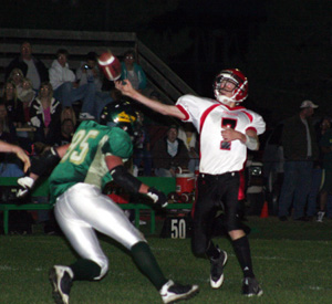 Beau Schlader throws for one of his 5 TD passes in the first half at Potlatch.