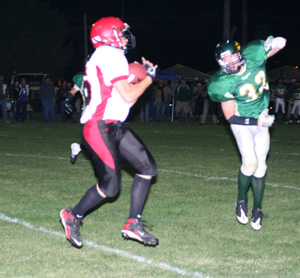 Cody Schumacher catches a touchdown pass at Potlatch.