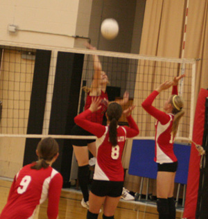 Tanna Schlader spikes the ball in the Border Battle Tournament.
