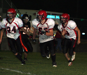 Justin Schmidt and Josh Roeper block for Devin Schmidt.