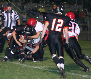 Josh Roeper and Devin Schmidt tackled a Kendrick ballcarrier. Ryan Dalgliesh, 21, moves toward the play.