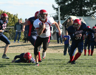Devin Schmidt leaves a tackler in his wake as he breaks loose for a big gain.