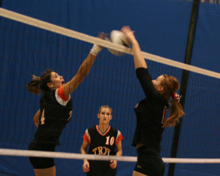 Kayla Johnson stuffs a Troy tip.