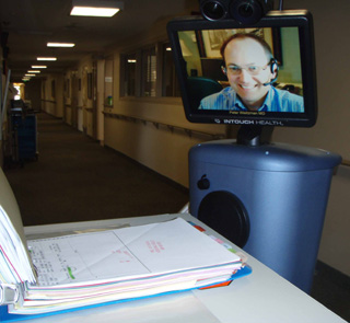 Dr. Peter Weitzman, a hospitalist with InHouse TeleMD based in the Spokane area, demonstrates his ability to read a chart using the RP-7 robot.  SMH will use the telehospitalist services to consult periodically about patients when a transfer is being considered.